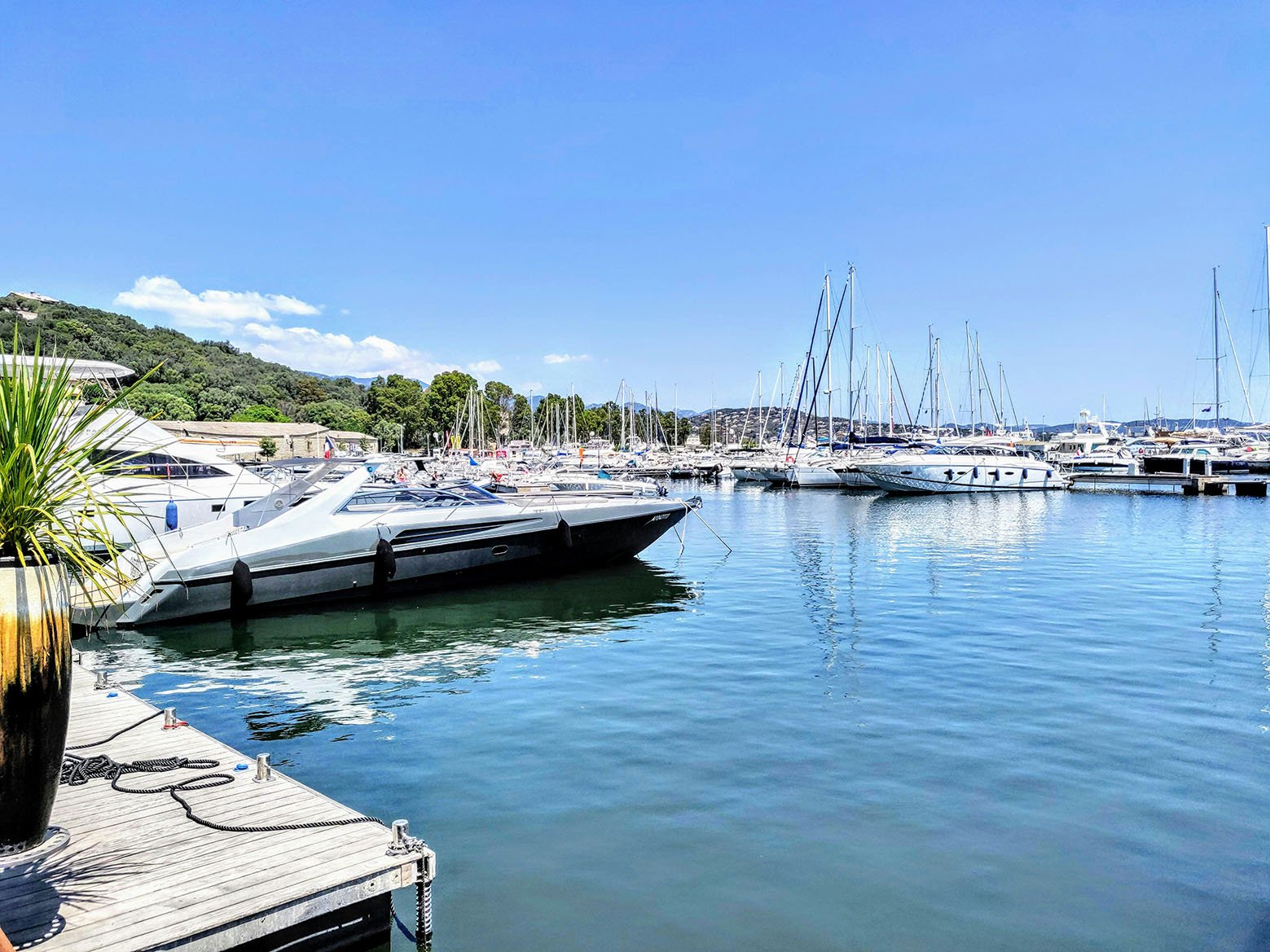 porto-veccho-corsica Photo by <a href="https://unsplash.com/@benoit1974?utm_content=creditCopyText&utm_medium=referral&utm_source=unsplash">Benoit Debaix</a> on <a href="https://unsplash.com/photos/white-and-black-boat-on-body-of-water-during-daytime-rfgj8PtaGgE?utm_content=creditCopyText&utm_medium=referral&utm_source=unsplash">Unsplash</a>